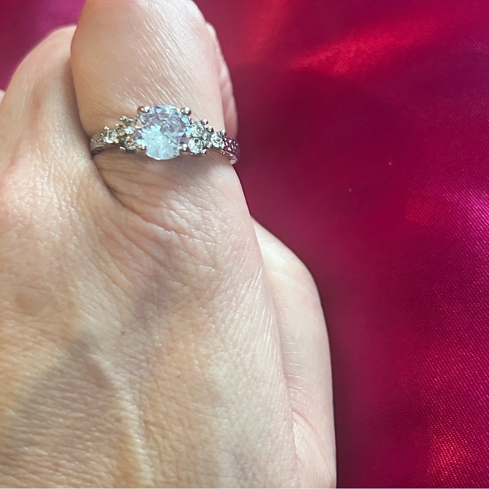 Sterling Silver and Cubit Zirconia Trilogy Ring Size 10 1/2.